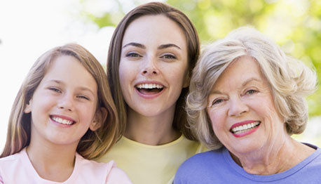 smiling mother daughter and grandmother